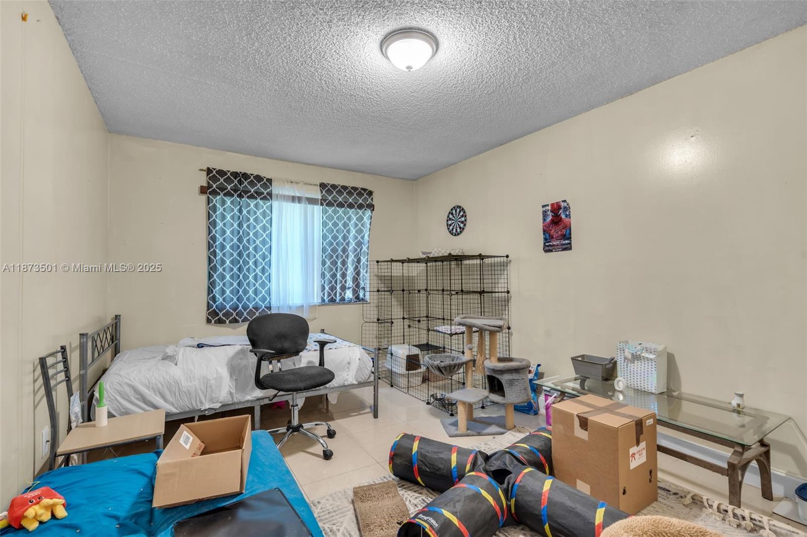 451 Ives Dairy Road, Unit 1031 Miami, FL 33179 - Photo 16 of 29 a living room with furniture and a window