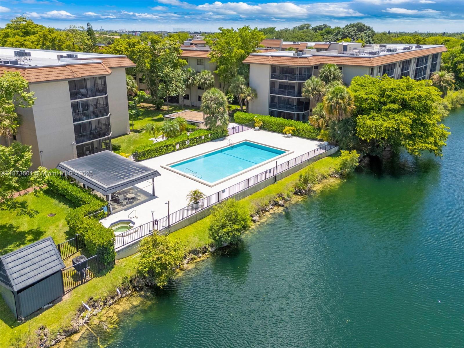 451 Ives Dairy Road, Unit 1031 Miami, FL 33179 - Photo 24 of 29 an aerial view of a house with a garden