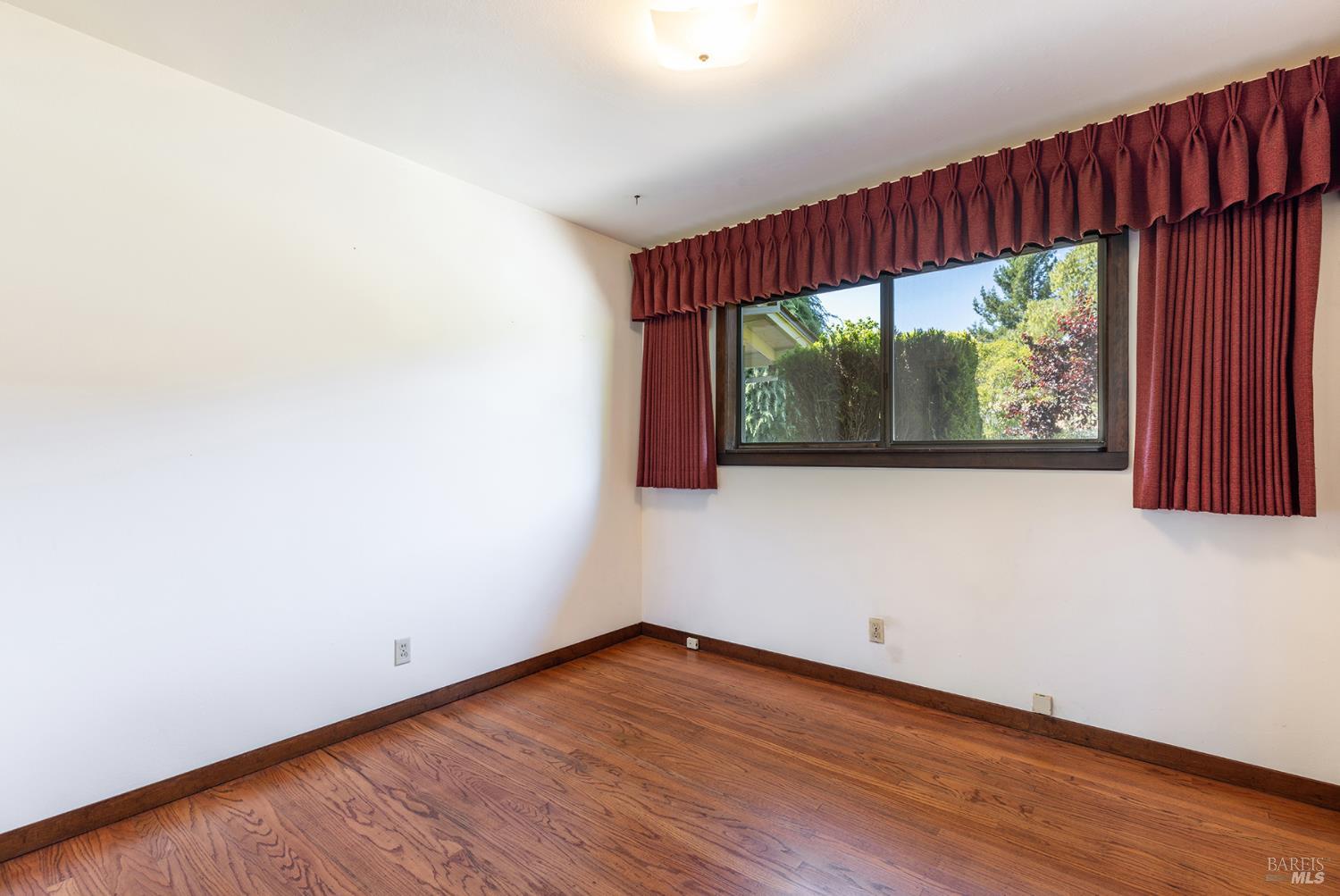 2236 West Hearn Avenue Santa Rosa, CA 95407 - Photo 27 of 56 a view of a room with wooden floor and a window