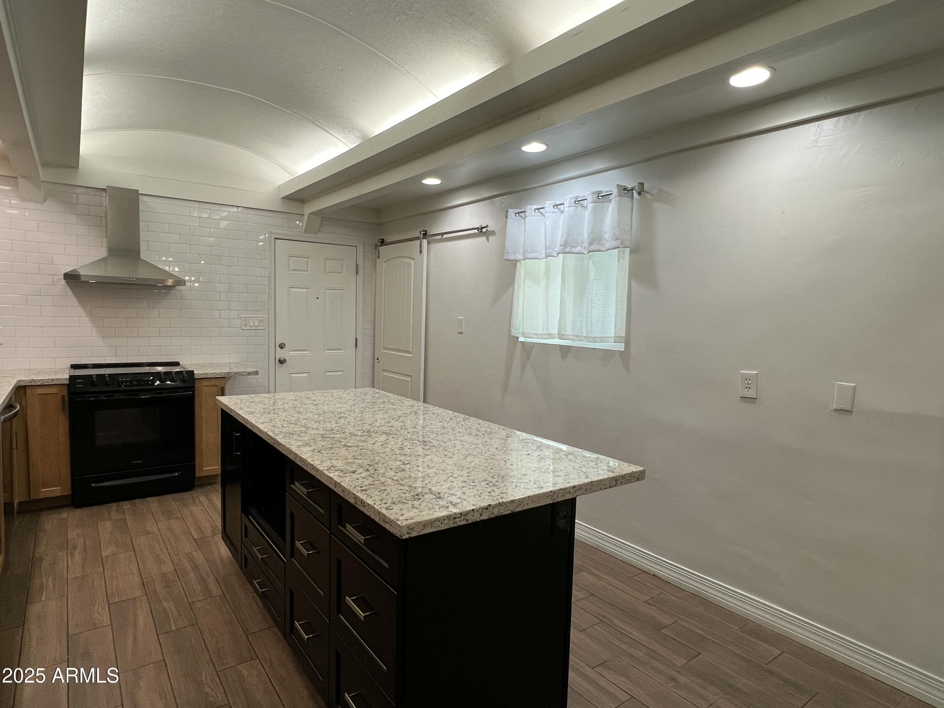 6202 North 14th Street, Unit 3/4 Phoenix, AZ 85014 - Photo 12 of 35 a kitchen with a stove and a sink