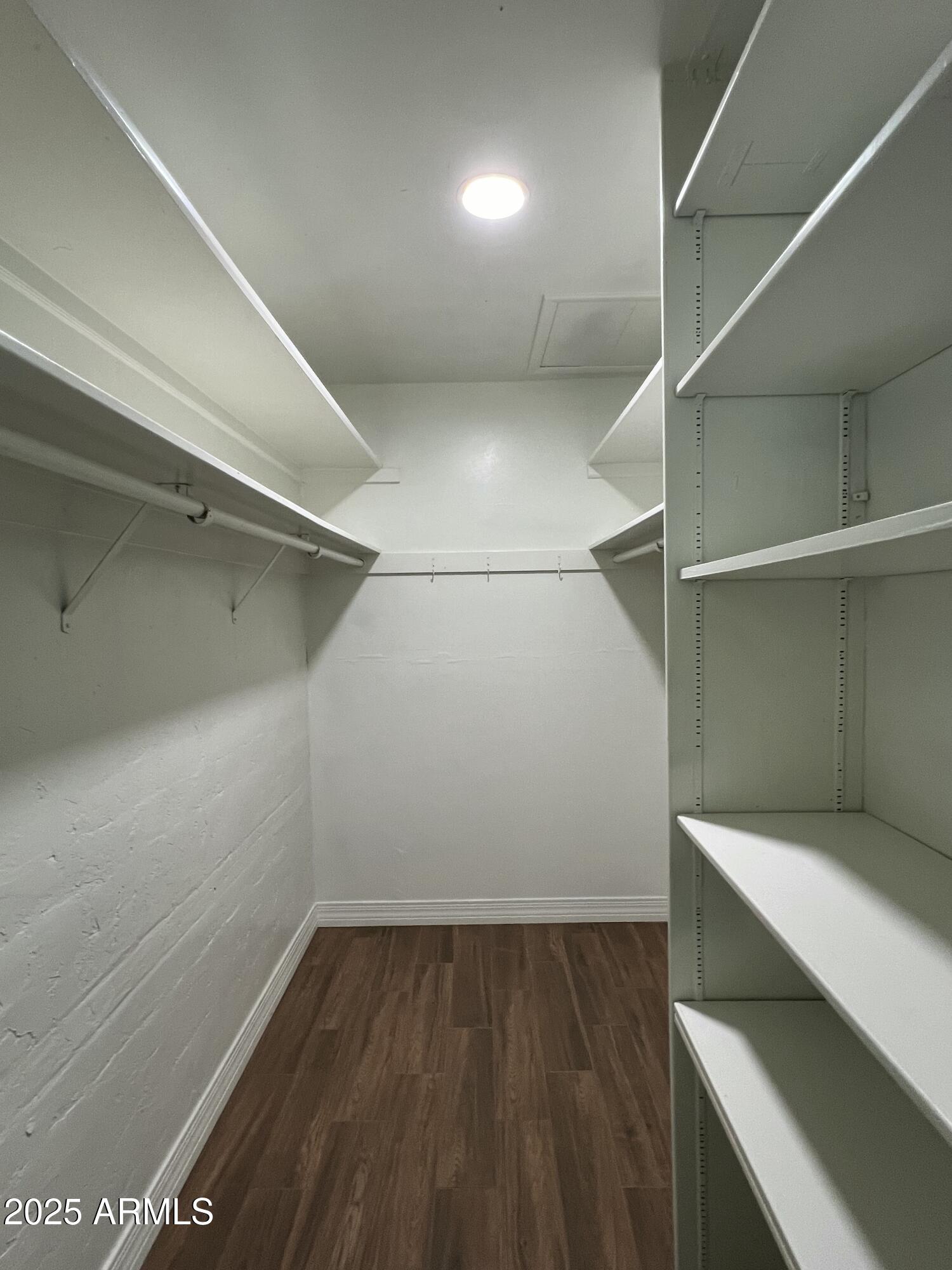 6202 North 14th Street, Unit 3/4 Phoenix, AZ 85014 - Photo 21 of 35 a view of an empty walk in closet