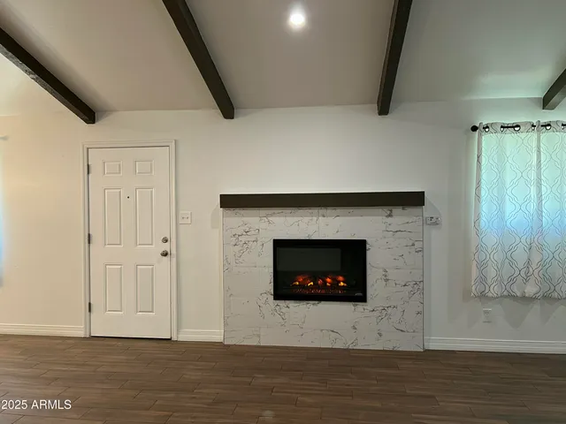 a living room with a fireplace