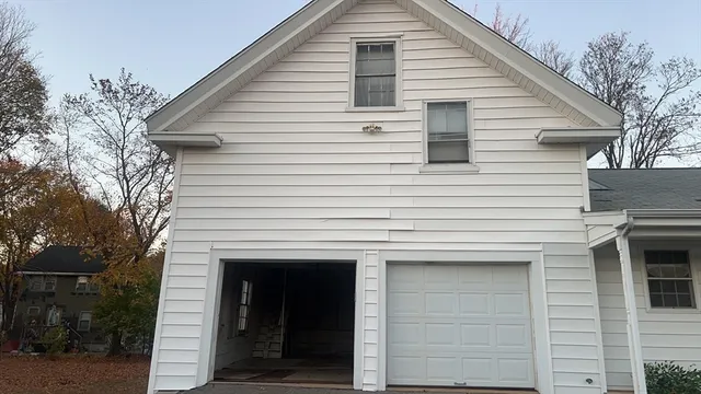 a view of a house with a garage