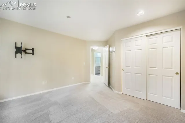 a view of a livingroom with furniture and windows