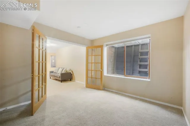 a view of a livingroom with a furniture and a window