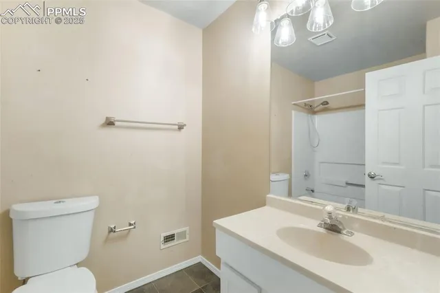 a house view with a backyard space