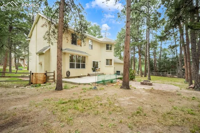 a view of a yard with an outdoor space
