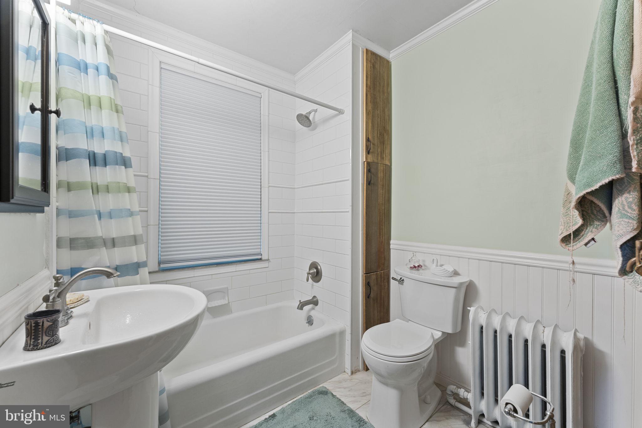 9039 Easton Road Ottsville, PA 18942 - Photo 22 of 61 a bathroom with a sink toilet and shower