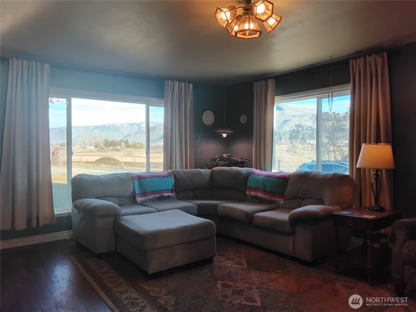 30 River Loop Road Tonasket, WA 98855 - Photo 15 of 37 a living room with furniture and a large window