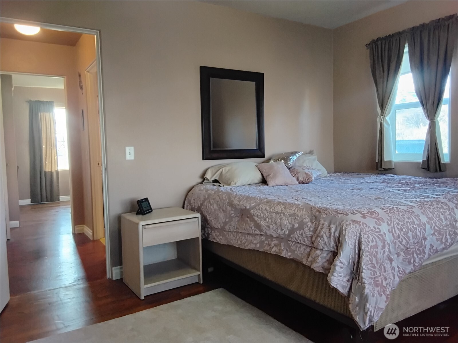 30 River Loop Road Tonasket, WA 98855 - Photo 27 of 37 a bedroom with a bed and a window