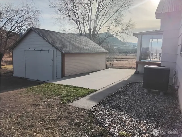 a house view with a backyard space