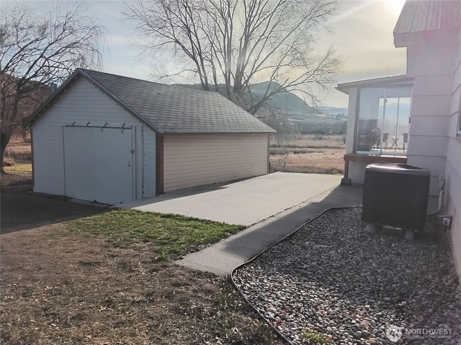 30 River Loop Road Tonasket, WA 98855 - Photo 6 of 37 a house view with a backyard space