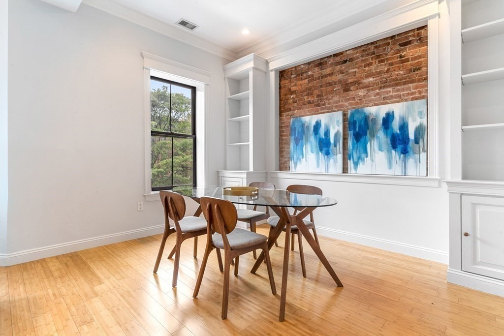 16 Worcester Square, Unit 3 Boston, MA 02118 - Photo 6 of 18 a view of a dining room with furniture window and outside view