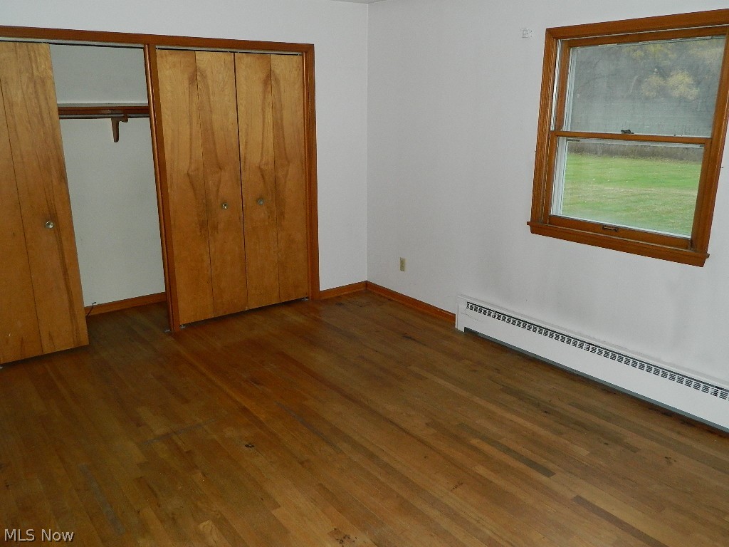 9284 Mayfield Road Chesterland, OH 44026 - Photo 16 of 33 Bedroom #2 with Hardwood Flooring and Two Adjoining Closets!