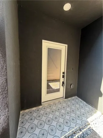 a view of a kitchen with a sink and chandelier fire place