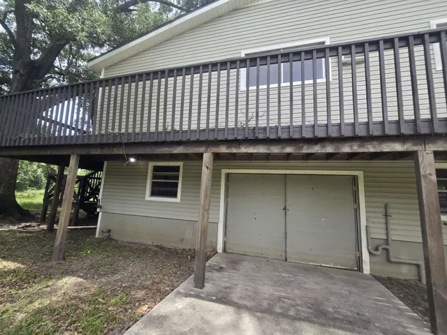 a view of a house with a porch
