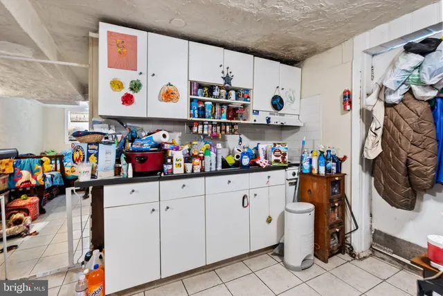 a room with storage and utility room