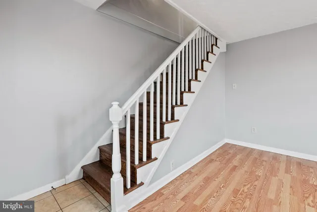 a view of entryway with wooden floor