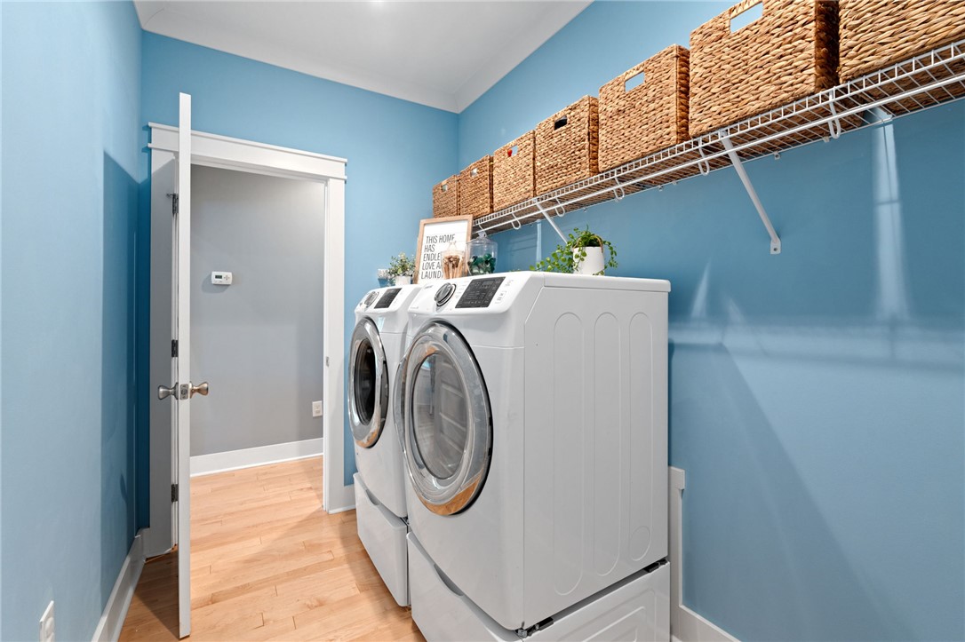1050 Old Dacusville Road Easley, SC 29640 - Photo 24 of 33 This dedicated laundry space offers practical convenience for daily chores.