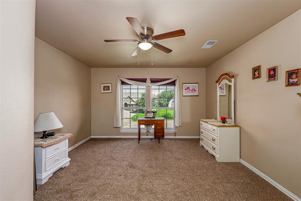 100 Manders Court Runaway Bay, TX 76426 - Photo 27 of 33 a living room with furniture and window