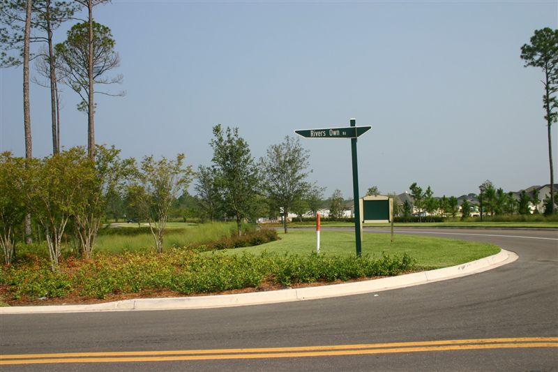322 River's Own Road St. Augustine, FL 32092 - Photo 1 of 1 a view of a house and a yard with a fountain