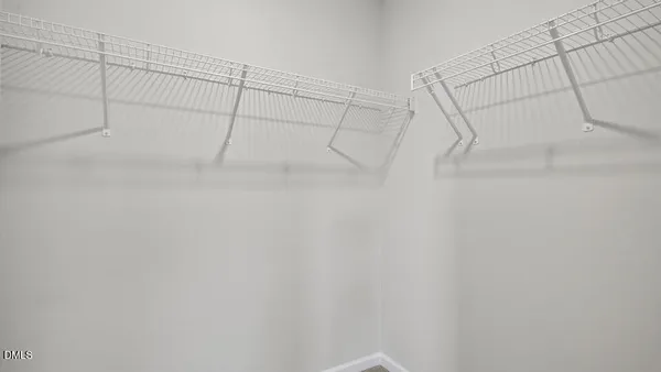 a view of a room with racks on the wall