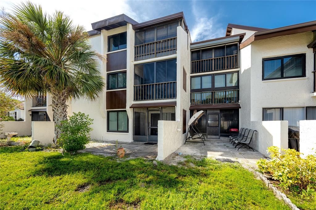 2207 Belleair Road, Unit B4 Clearwater, FL 33764 - Photo 37 of 37 a house view with a garden space