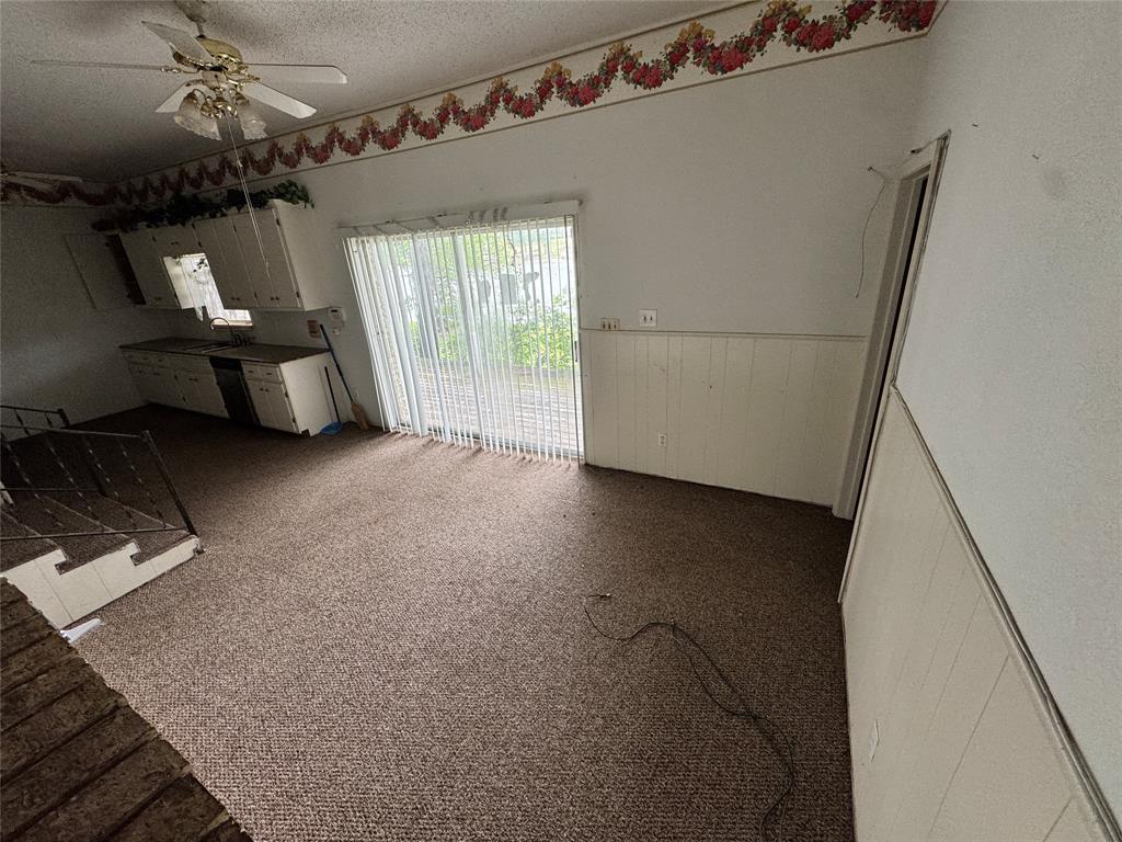 3909 Smothers Road Caney City, TX 75148 - Photo 13 of 35 a view of a livingroom with furniture and windows