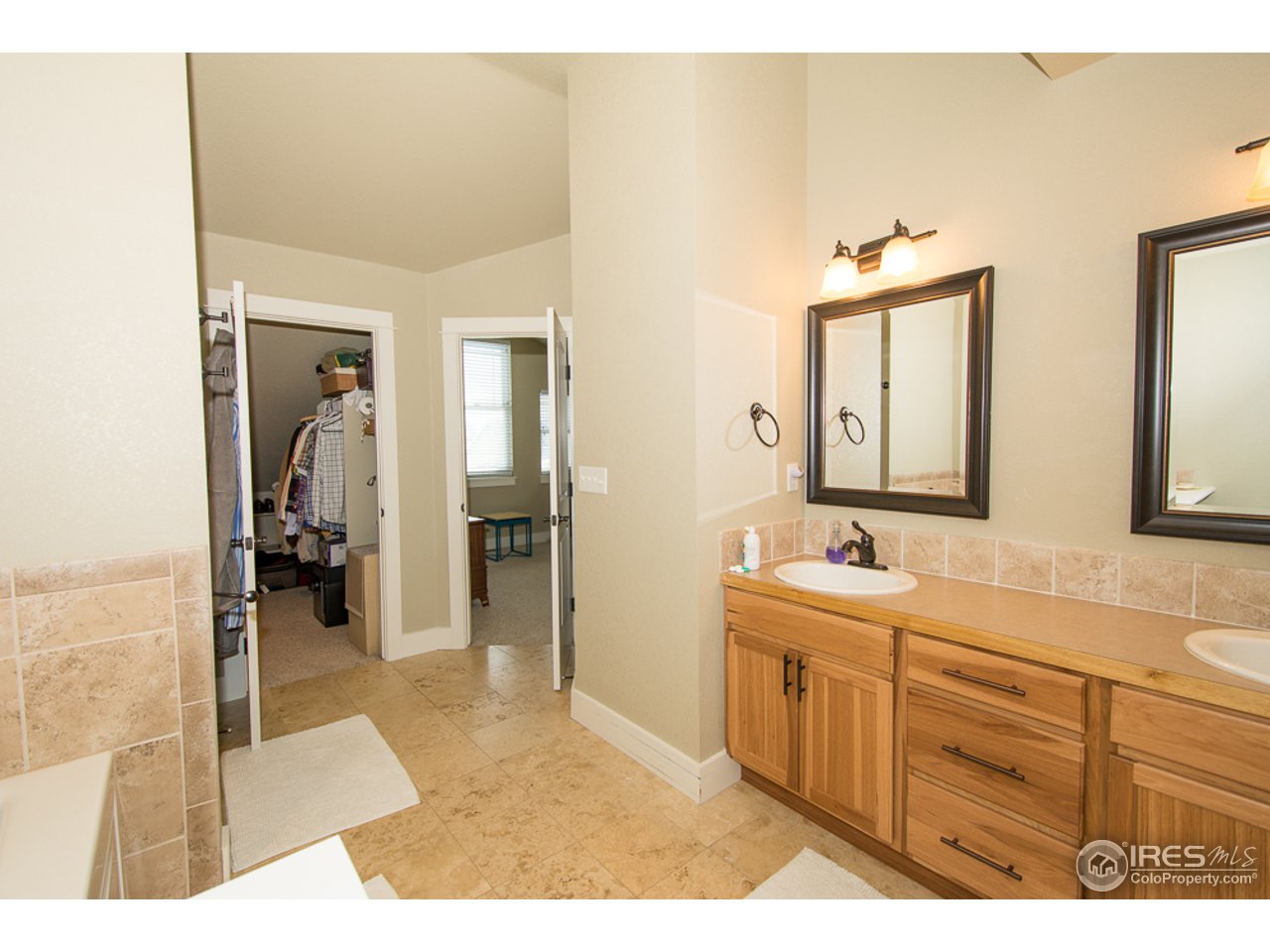 915 Ridge Runner Drive Fort Collins, CO 80524 - Photo 20 of 25 Master Bath and Closet