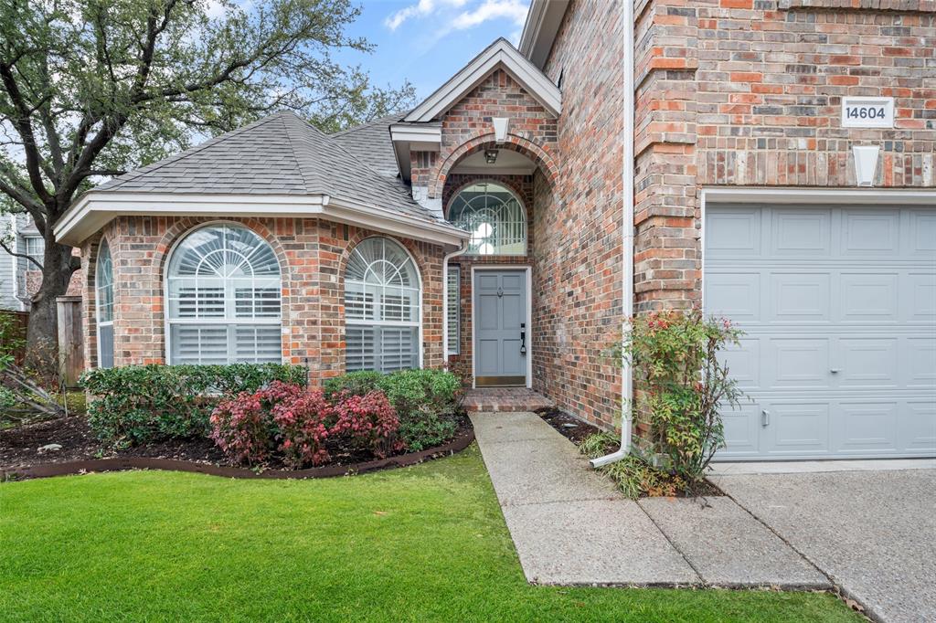 14604 Hemingway Court Addison, TX 75001 - Photo 3 of 27 a front view of a house with garden