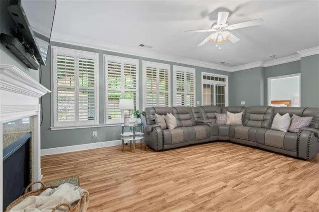 a large kitchen with white cabinets