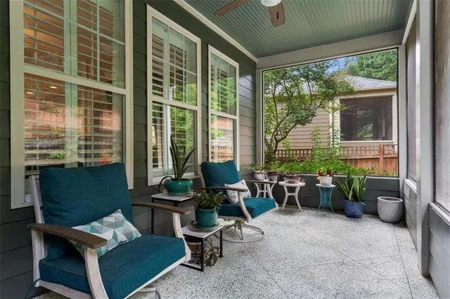 an aerial view of city lake and residential houses with outdoor space