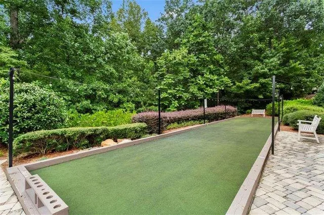 a en suite bathroom with a sink and a mirror
