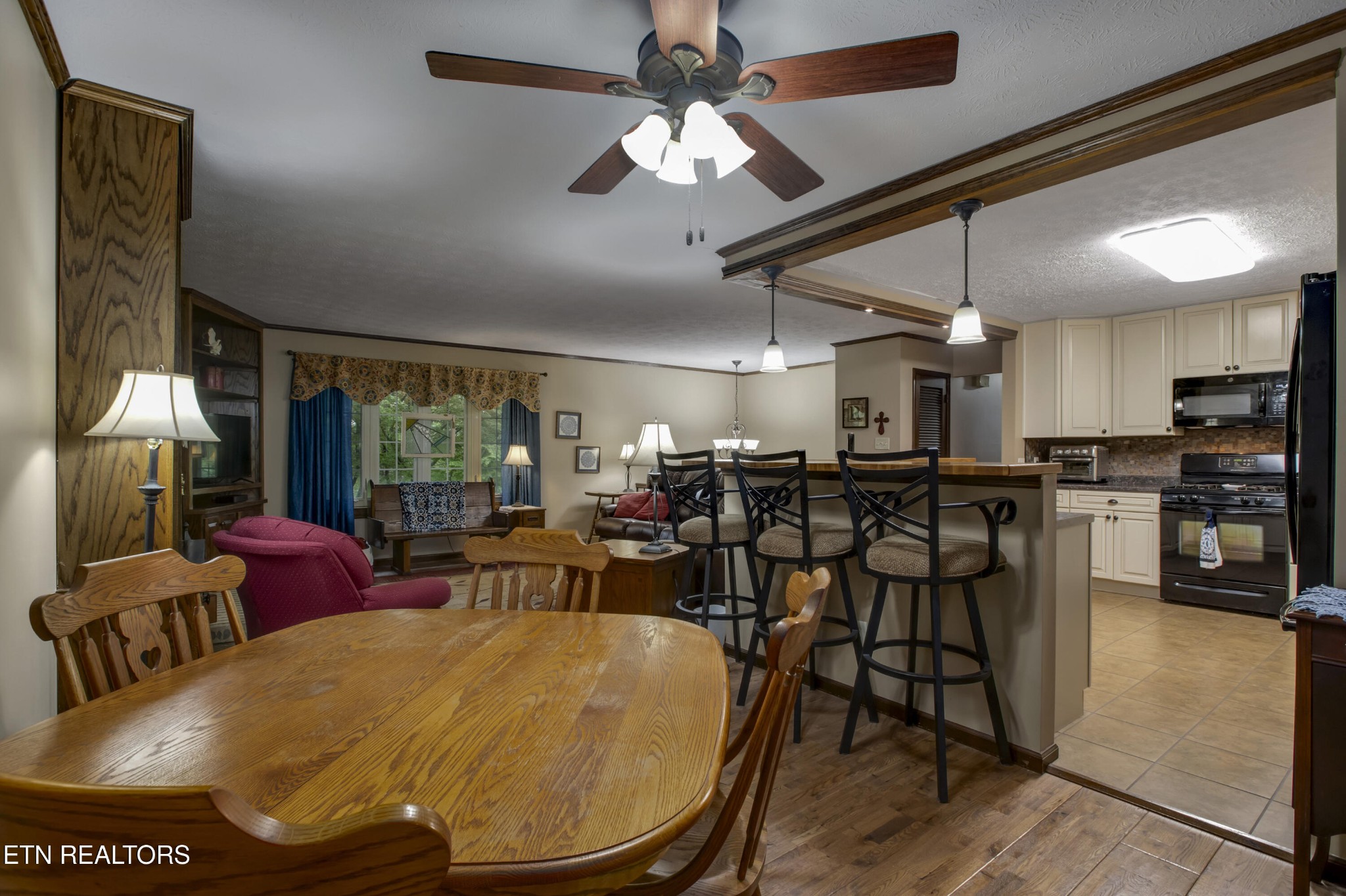 116 Mohawk Road Oak Ridge, TN 37830 - Photo 11 of 60 a view of a dining room with furniture window and outside view