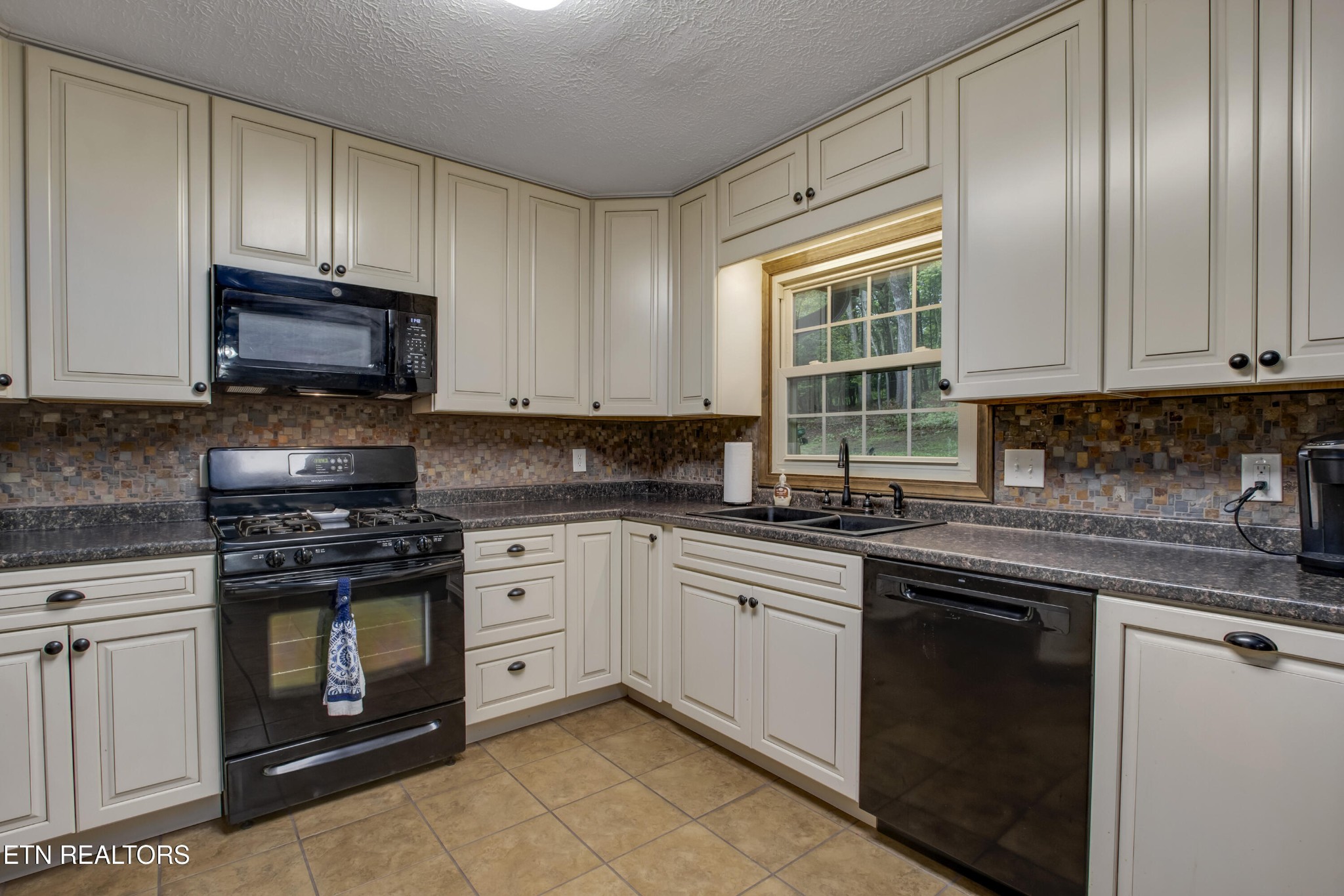 116 Mohawk Road Oak Ridge, TN 37830 - Photo 13 of 60 a kitchen with granite countertop cabinets stainless steel appliances and a sink