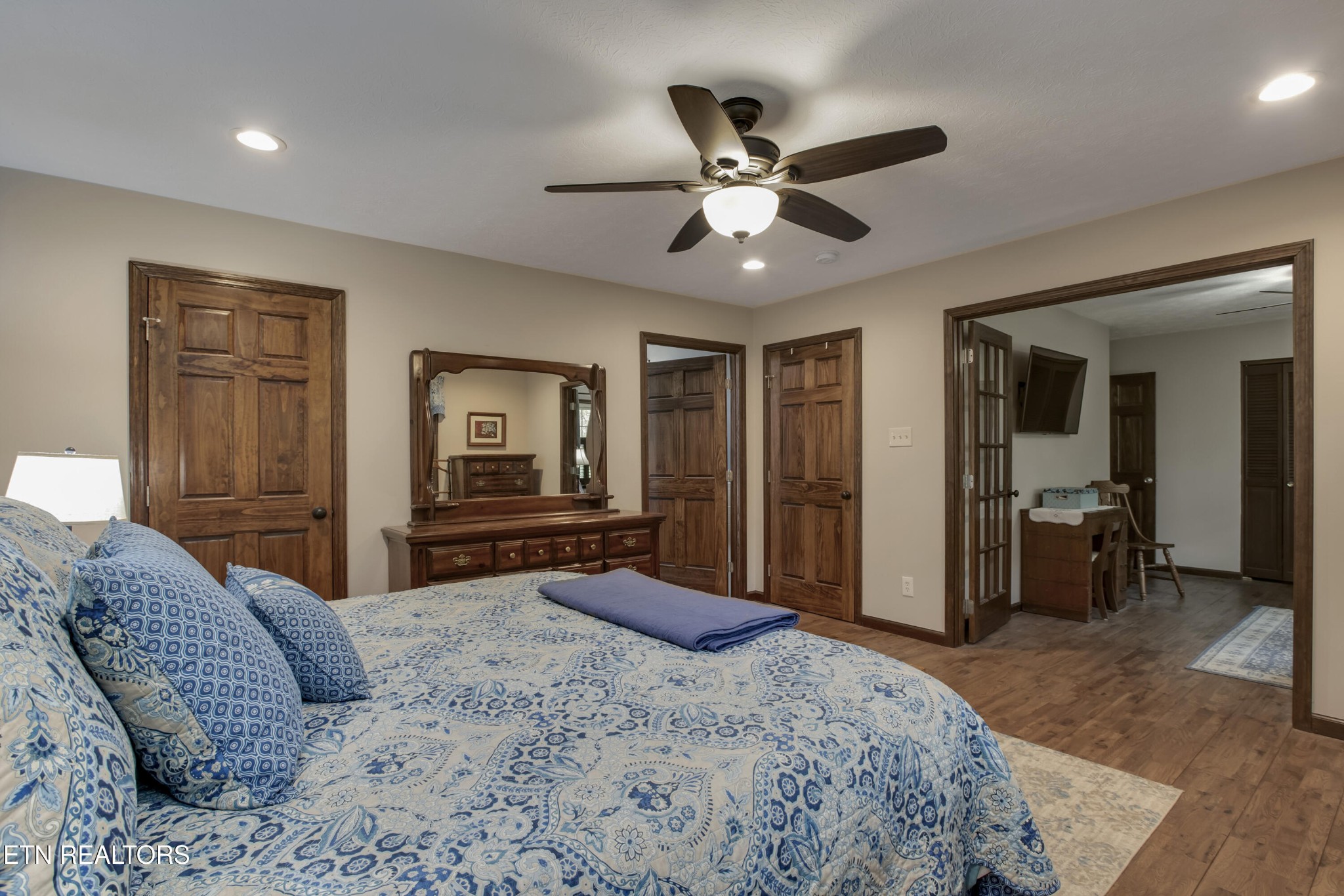 116 Mohawk Road Oak Ridge, TN 37830 - Photo 22 of 60 a bedroom with a bed and a large mirror on dresser