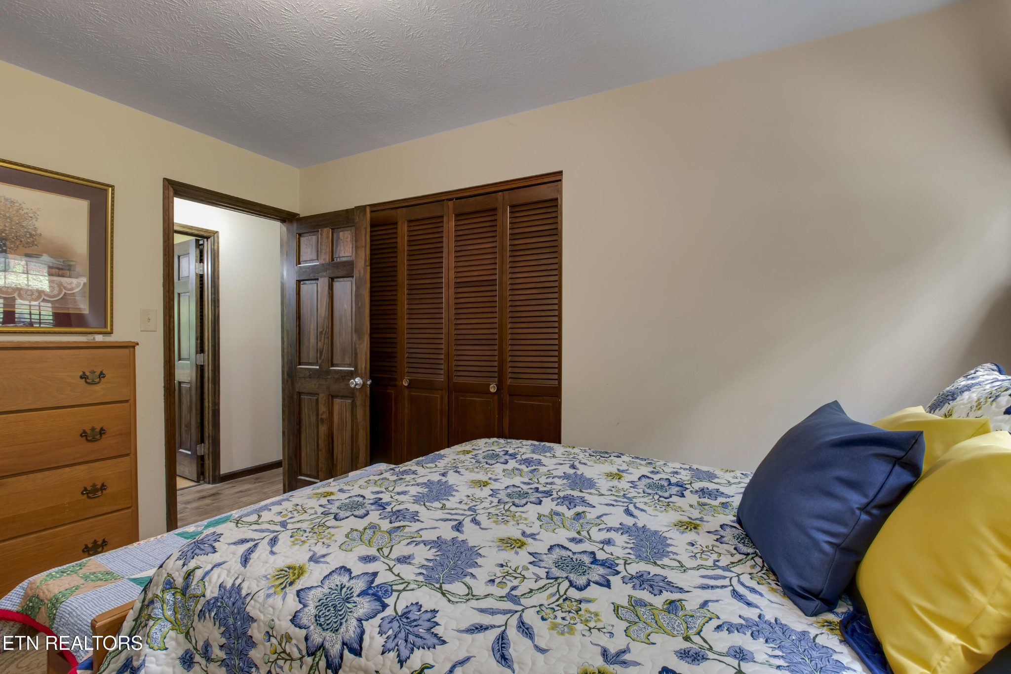 116 Mohawk Road Oak Ridge, TN 37830 - Photo 32 of 60 a bedroom with a bed and a dresser