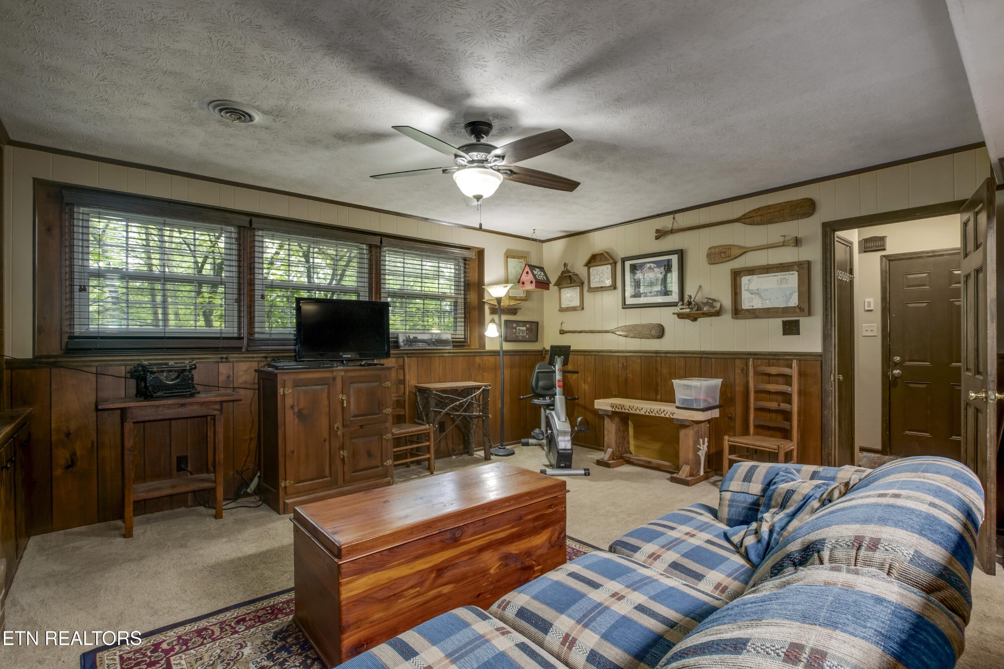 116 Mohawk Road Oak Ridge, TN 37830 - Photo 36 of 60 a living room with furniture and a flat screen tv
