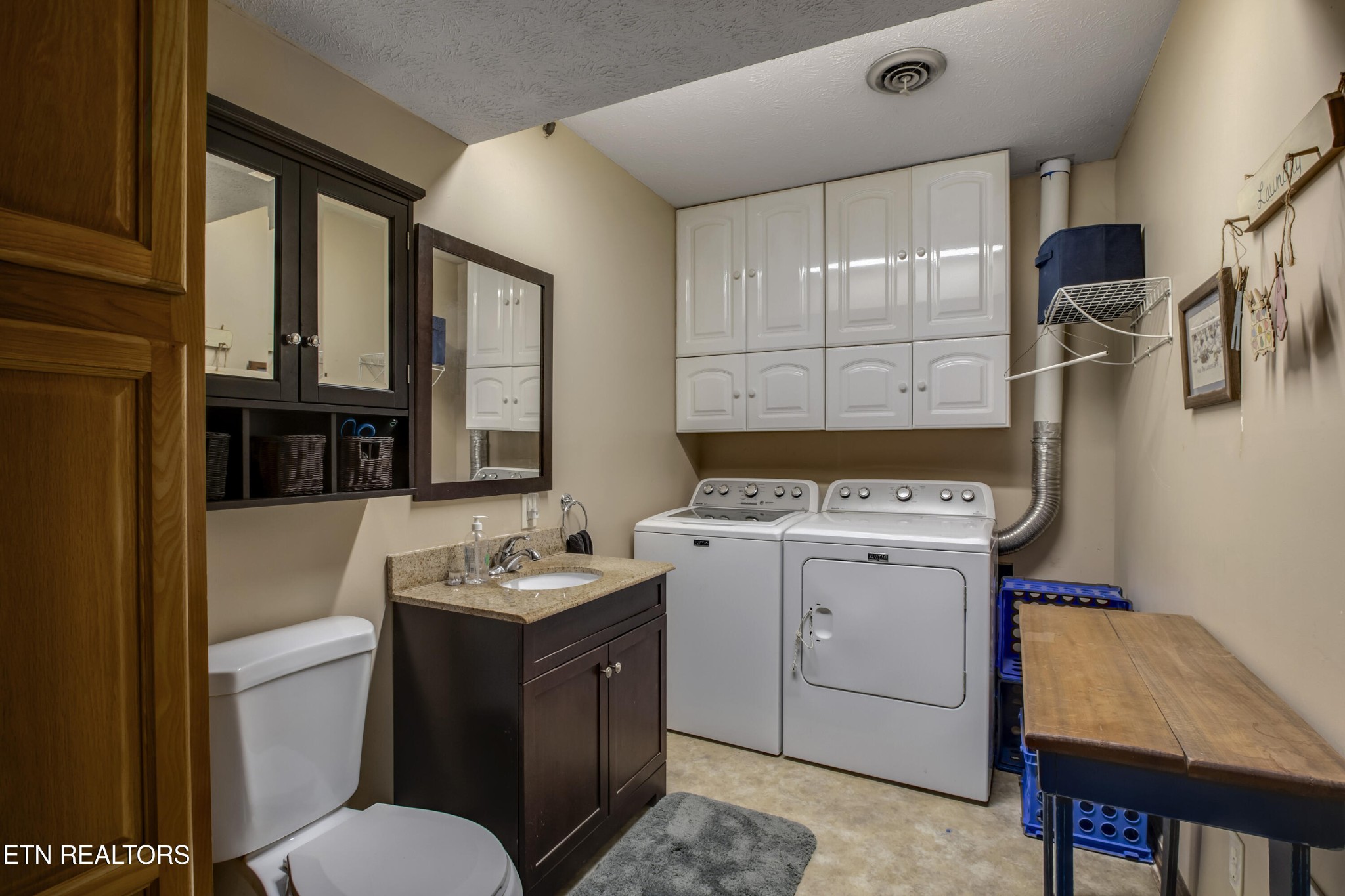 116 Mohawk Road Oak Ridge, TN 37830 - Photo 43 of 60 a bathroom with a granite countertop sink toilet and a mirror
