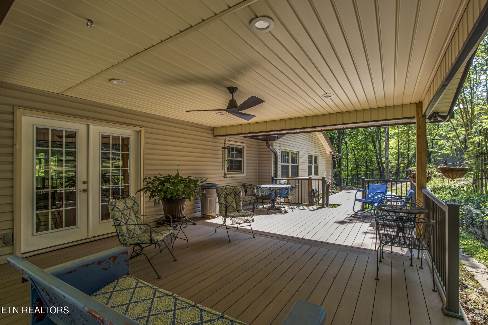 116 Mohawk Road Oak Ridge, TN 37830 - Photo 49 of 60 a living room with patio furniture and wooden floor