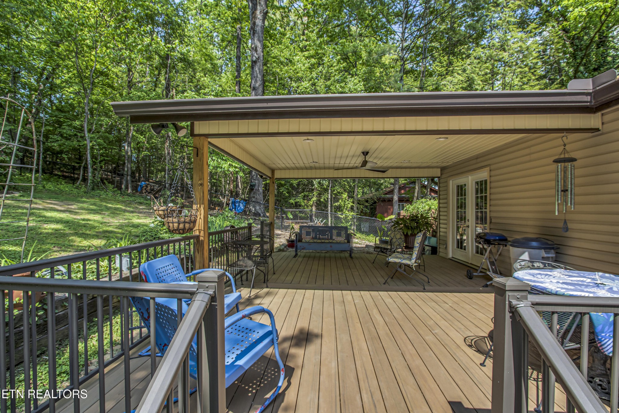 116 Mohawk Road Oak Ridge, TN 37830 - Photo 50 of 60 a view of a balcony with chairs and wooden floor