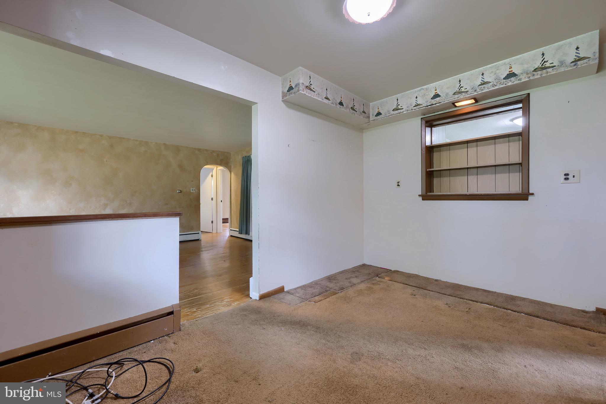 864 Kimmerlings Road Lebanon, PA 17046 - Photo 11 of 40 Space between living room and dining room