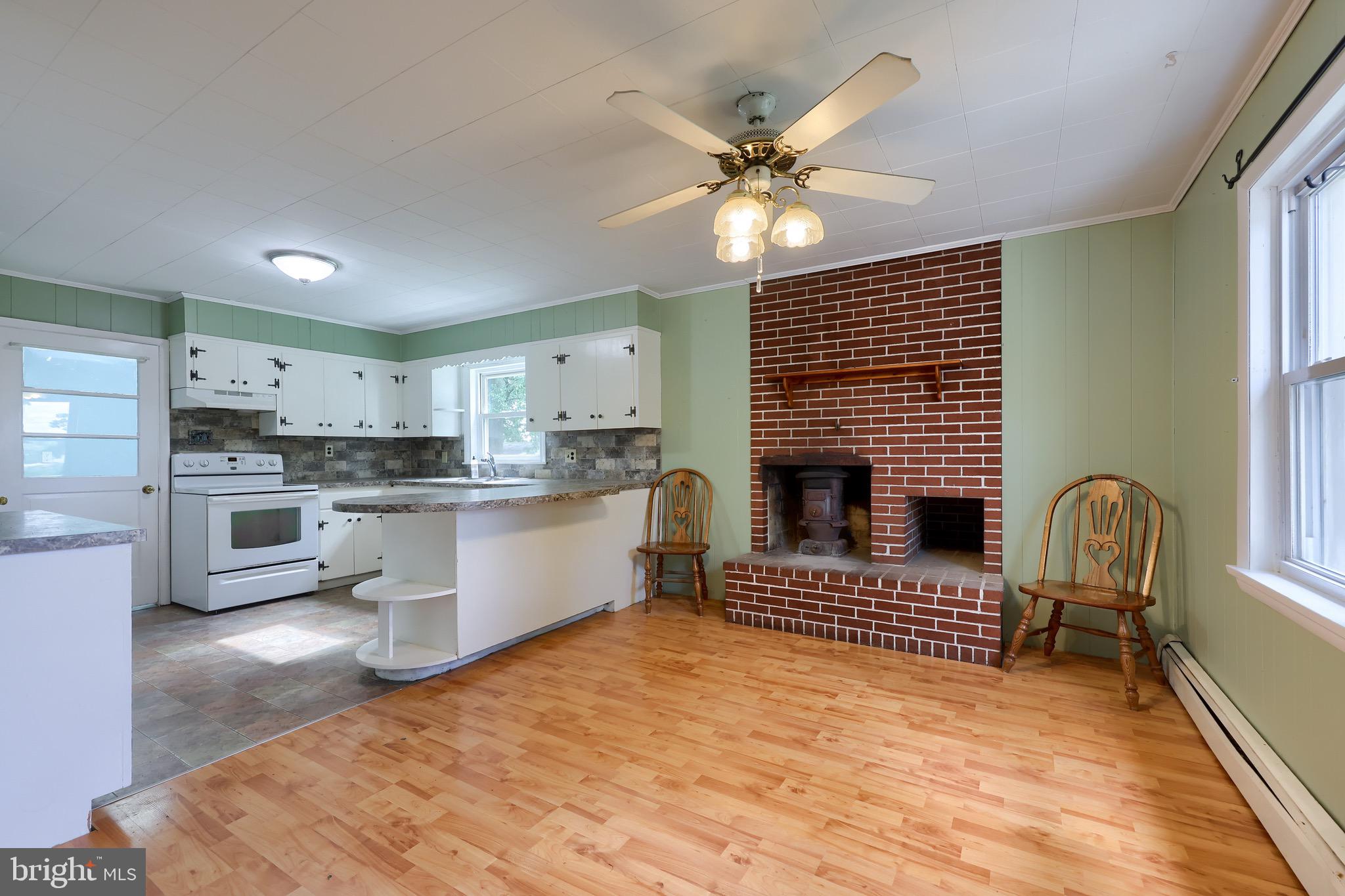 864 Kimmerlings Road Lebanon, PA 17046 - Photo 15 of 40 Dining room with fireplace