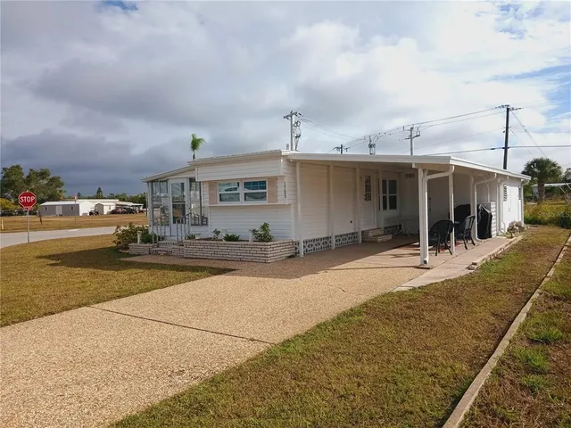 a view of a terrace sink and a backyard