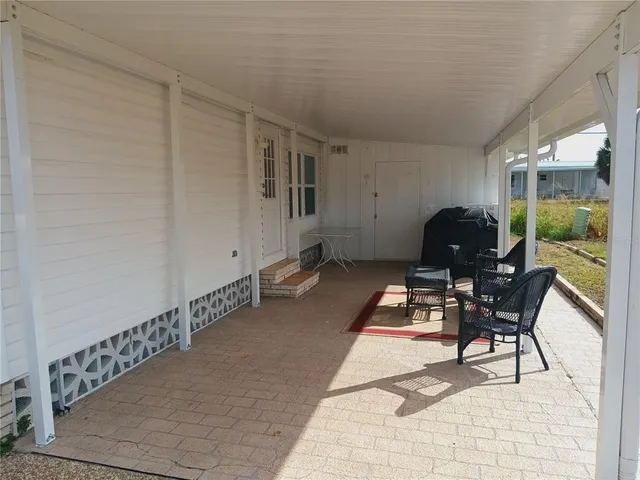 a view of a storage & utility room with a sink