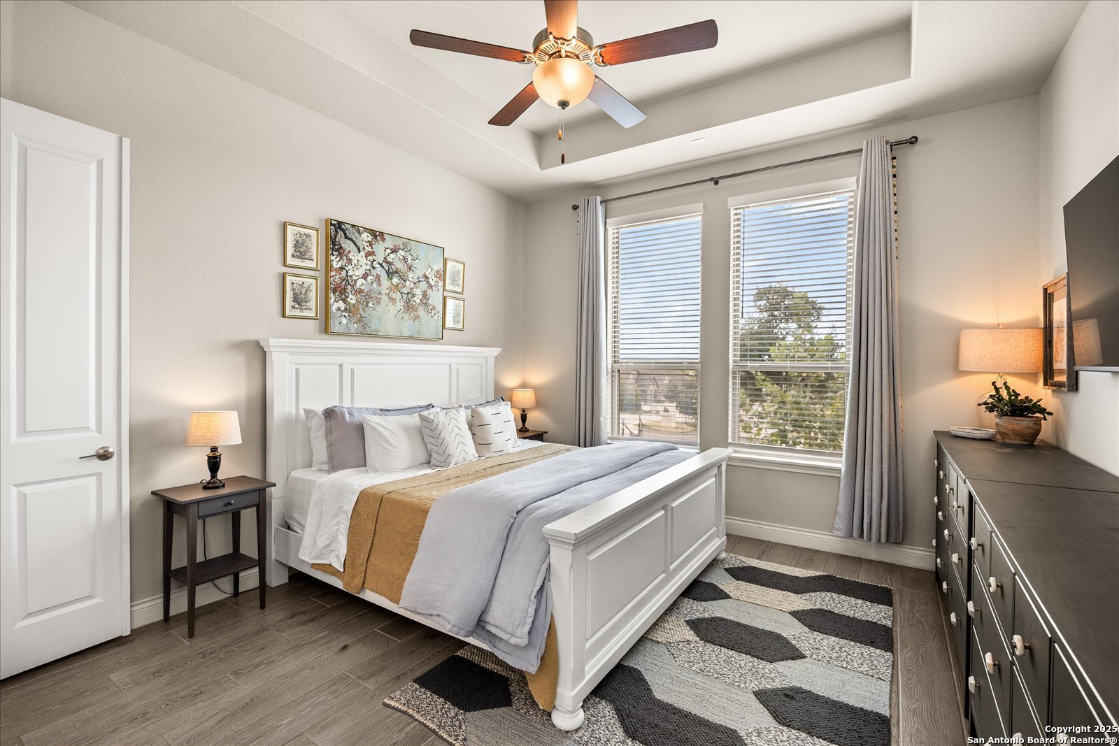 126 Ocotillo Boerne, TX 78006 - Photo 23 of 47 a bed room with a bed and a chandelier