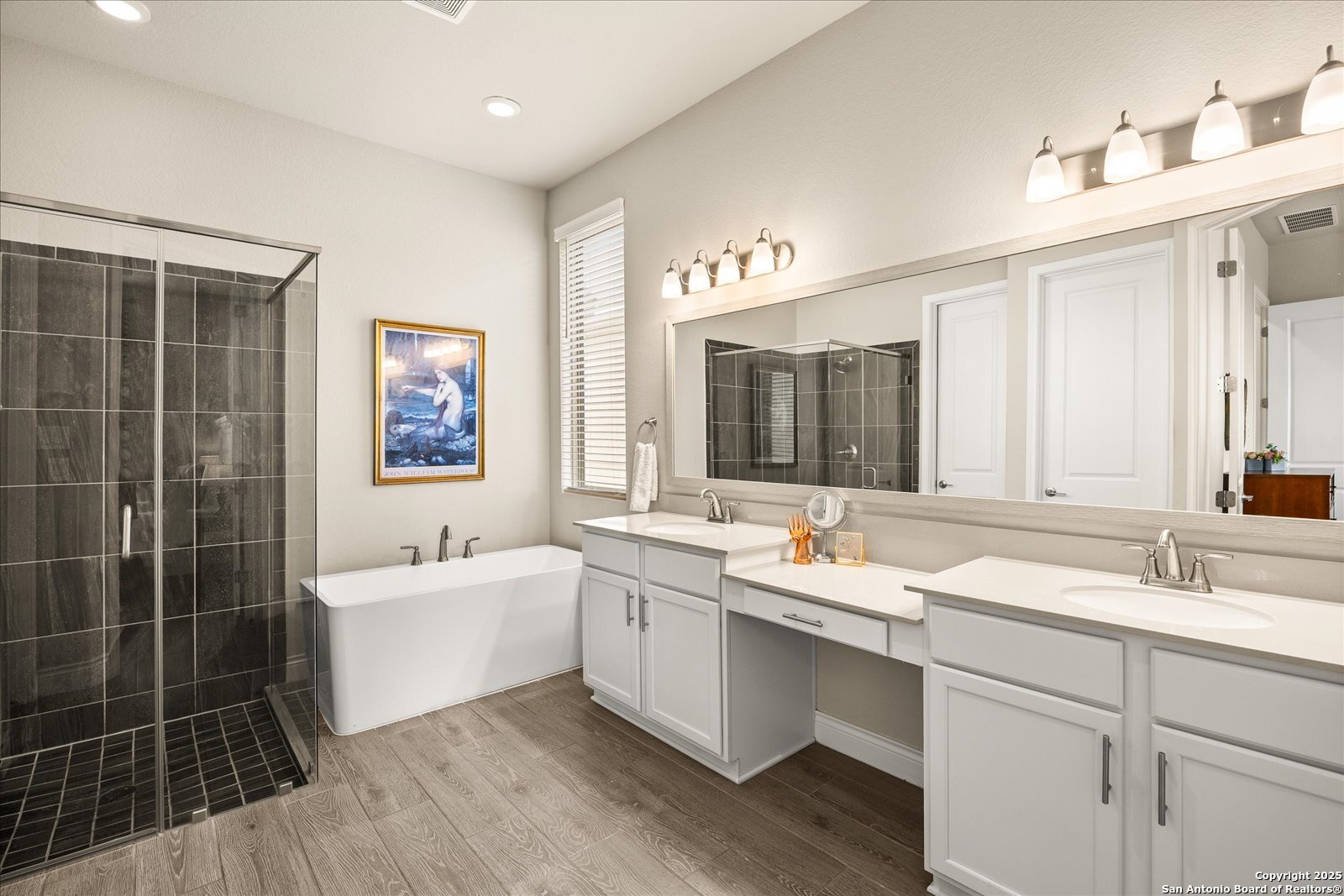 126 Ocotillo Boerne, TX 78006 - Photo 25 of 47 a bathroom with a tub sink and mirror