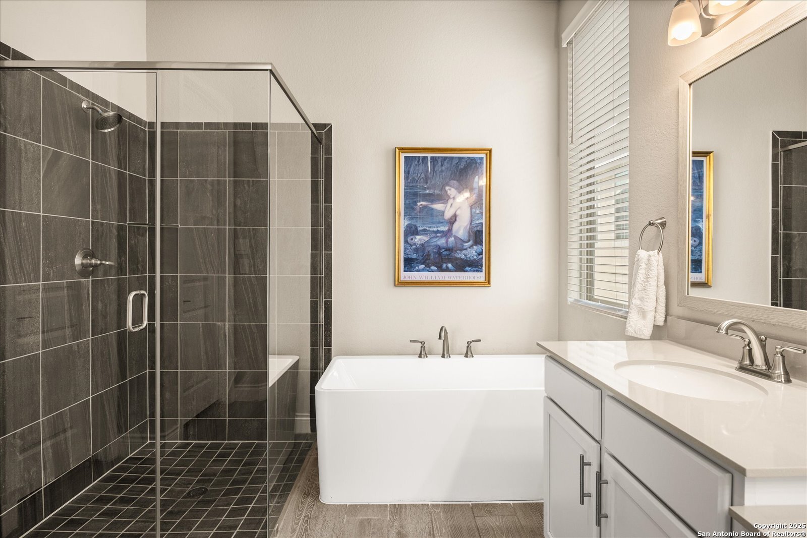 126 Ocotillo Boerne, TX 78006 - Photo 26 of 47 a bathroom with a shower sink and mirror