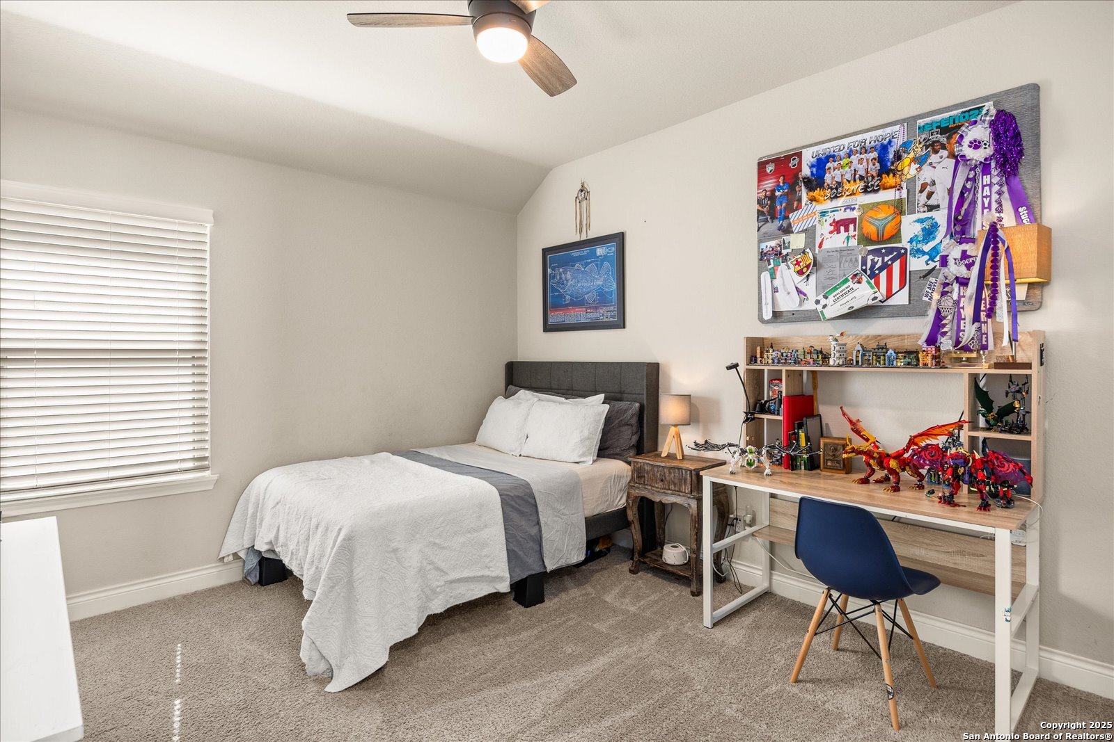 126 Ocotillo Boerne, TX 78006 - Photo 30 of 47 a bedroom with a bed and a bookshelf