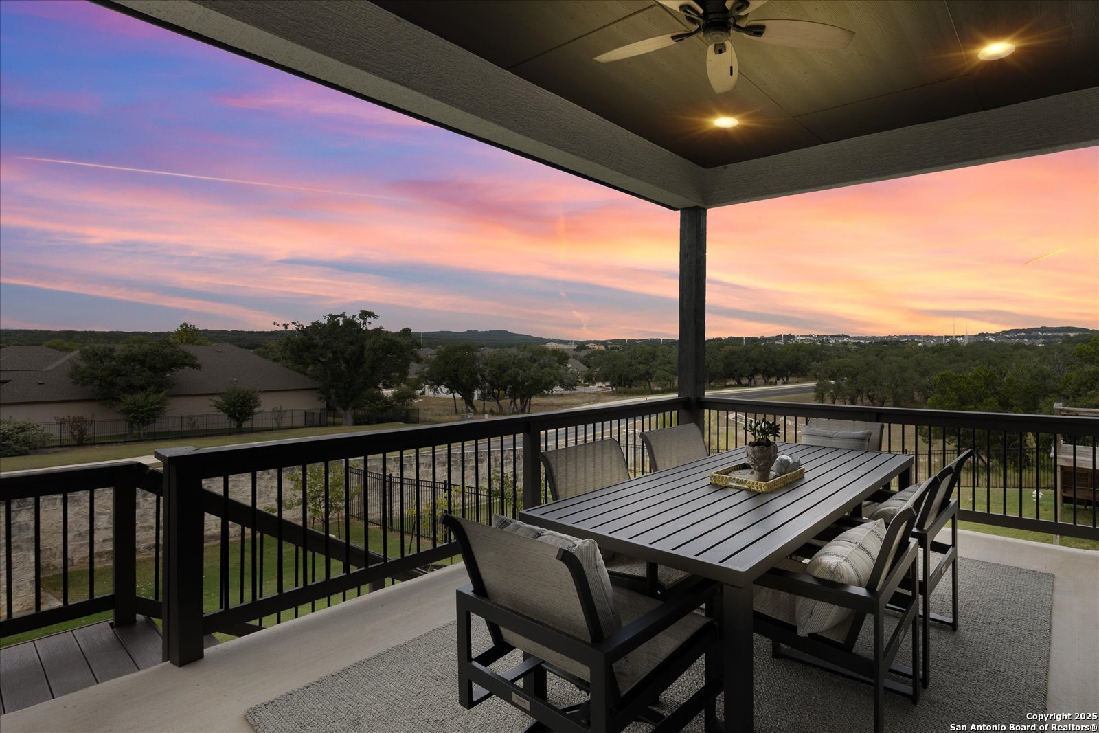 126 Ocotillo Boerne, TX 78006 - Photo 3 of 47 a view of a balcony with furniture and wooden floor